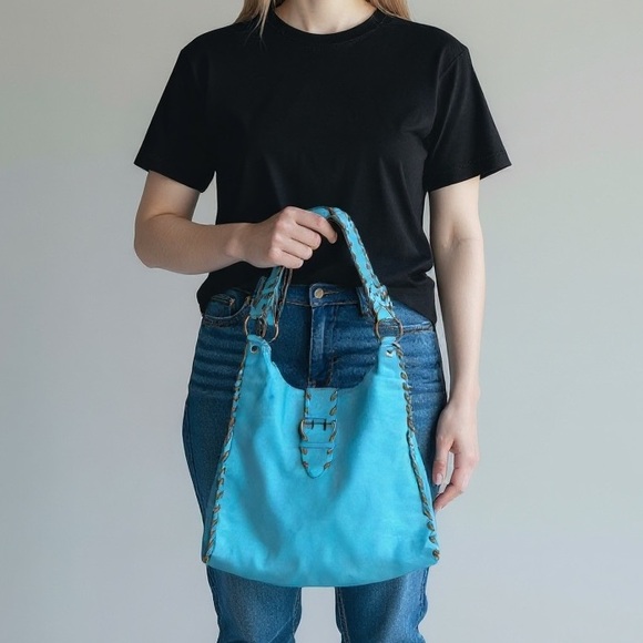 carla mancini Handbags - Carla Mancini open stitch leather braid through string blue leather slouch bag